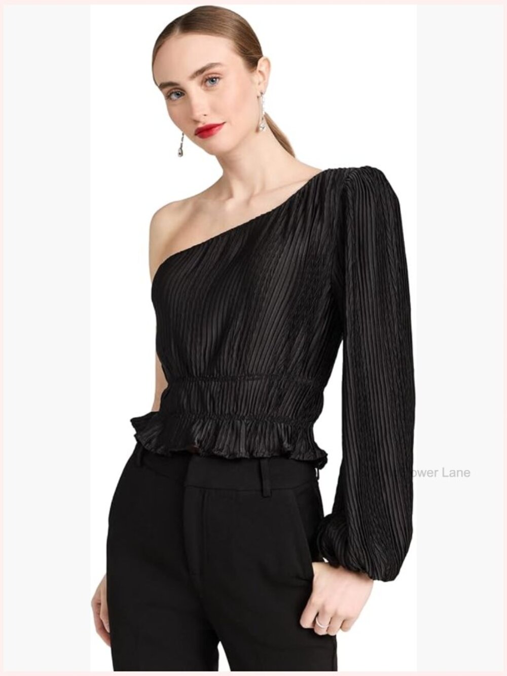 Structured crop top with one shoulder and ruffle details